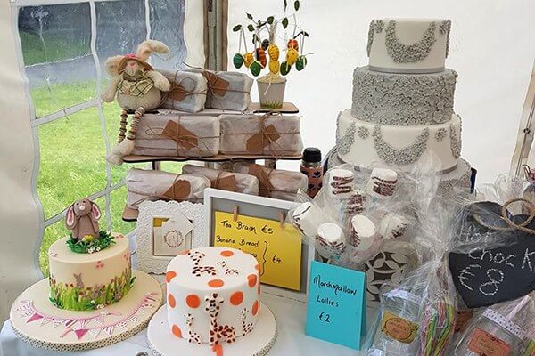The Cake Emporium display on a table at the market.